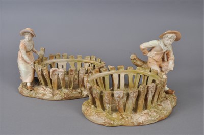 Lot 185 - Pair of Royal Worcester figural basket dishes