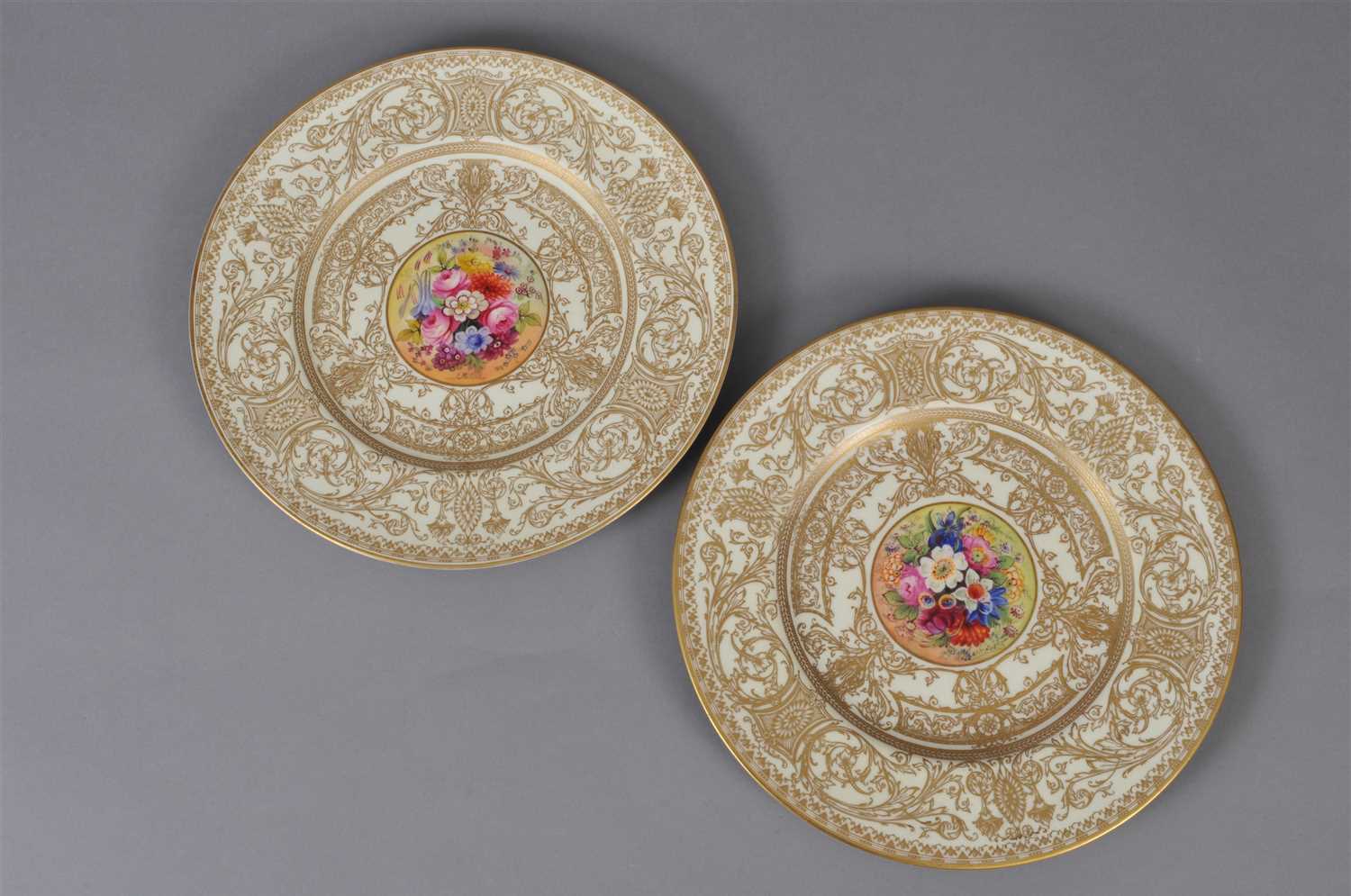 Lot 216 - Pair of Royal Worcester floral and gilt cabinet plates