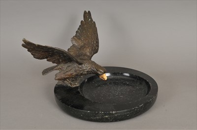 Lot 195 - An early 20th century French bronze and ivory group surmounting a black marble bowl