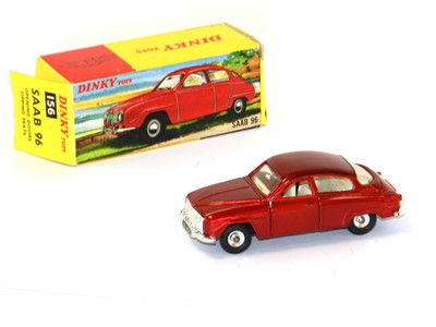 Lot 380 - Dinky 156 Saab 96, boxed. In metallic red with...