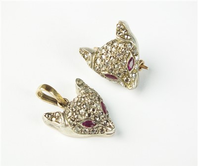 Lot 132 - A rose cut diamond and ruby set foxes head brooch and pendant