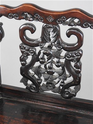 Lot 54 - A Chinese carved rosewood chair, early 20th...