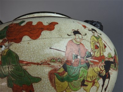 Lot 29 - A Chinese crackle glaze pottery squat jar,...