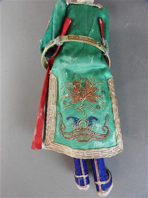 Lot 51 - A Chinese painted wood doll, late Qing Dynasty,...