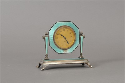 Lot 282 - A small silver and guilloche enamelled mantel clock