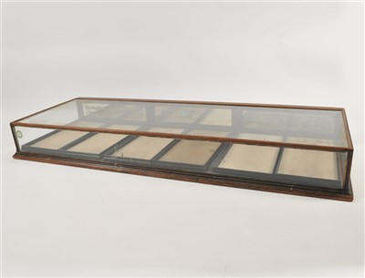 Lot 485 - A large 20th century stained mahogany glazed counter-top display case