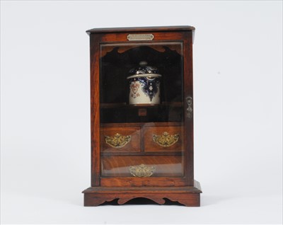 Lot 737 - A late Victorian oak smoker's cabinet and a Mason's ironstone washing set