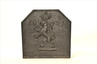 Lot 744 - A 17th century or later cast iron fire back
