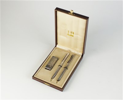 Lot 60 - A commemorative Dunhill cased lighter, fountain pen and biro set
