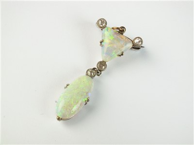 Lot 88 - An opal and diamond pendant/brooch