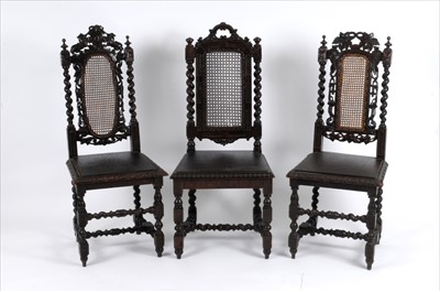 Lot 324 - A harlequin set of eight 19th century Carolean carved oak dining chairs