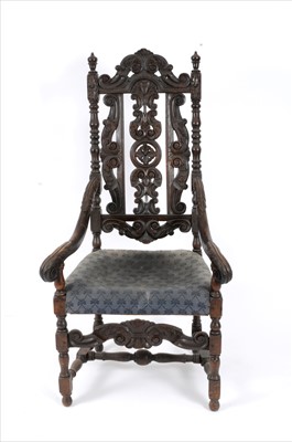 Lot 325 - A 19th century Carolean style carved oak armchair