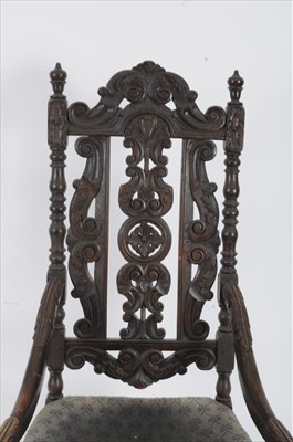 Lot 325 - A 19th century Carolean style carved oak armchair