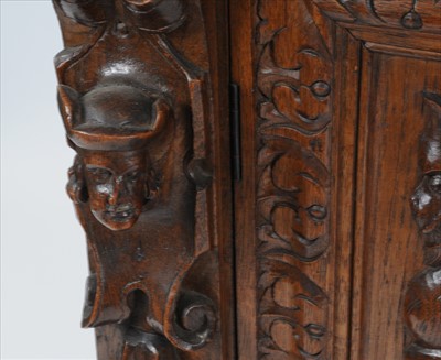 Lot 749 - A late 19th century continental carved oak hall cupboard in the Flemish style