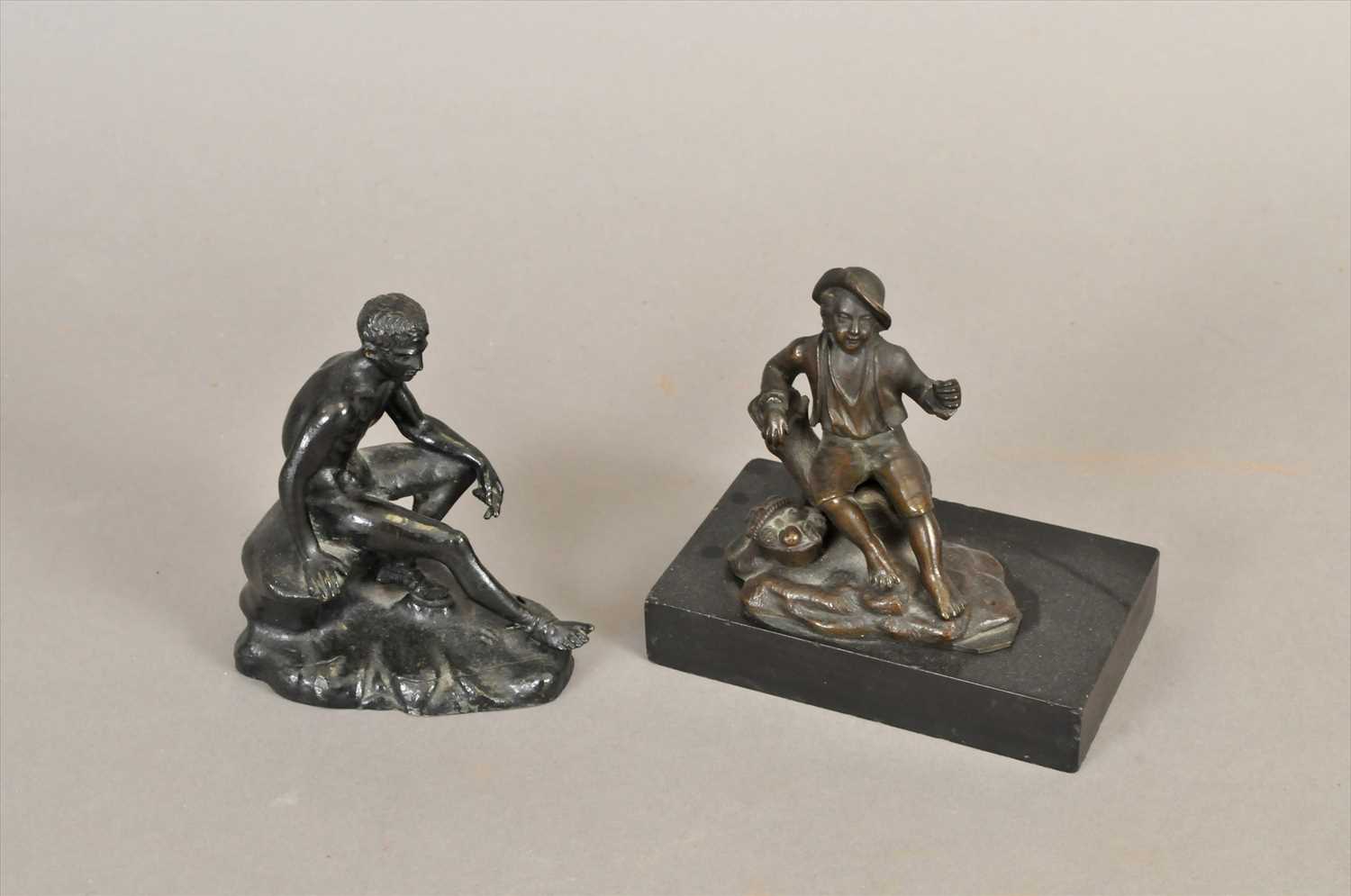Lot 459 - A small 19th century bronze study of the seated Hermes and a further small bronze figure