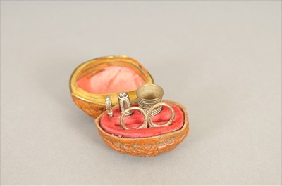 Lot 485 - A mid 19th century miniature sewing etui cased in a walnut