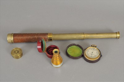 Lot 733 - A cased pocket barometer by Negretti & Zambra and two telescopes