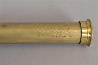 Lot 733 - A cased pocket barometer by Negretti & Zambra and two telescopes