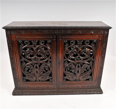 Lot 763 - A 19th century carved rosewood Anglo-Indian hall cupboard