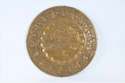 Lot 718 - A large decorative early 20th century Indian cast metal wall-hanging charger