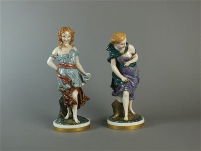 Lot 240 - A pair of Royal Worcester porcelain figures