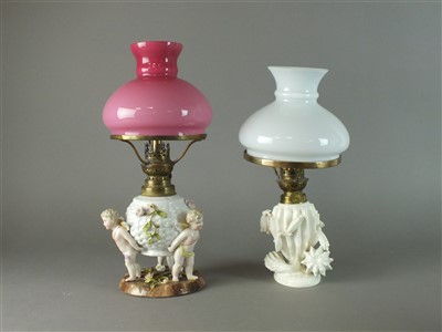 Lot 244 - Two Victorian porcelain oil lamps