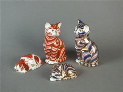 Lot 209 - Four Royal Crown Derby paperweights of cats and a dog