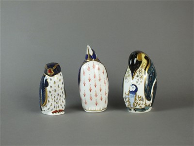 Lot 211 - Three Royal Crown Derby penguin paperweights