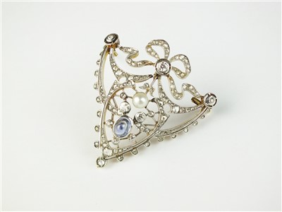 Lot 133 - An early 20th century diamond, pearl and sapphire brooch