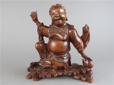 Lot 510 - A Chinese boxwood figure of Liu Haichan, the...