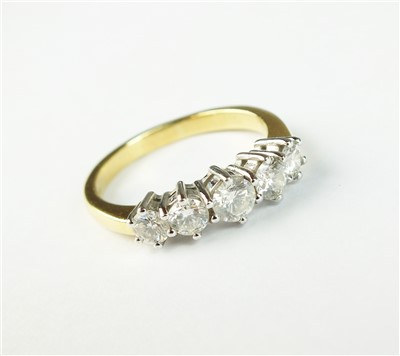 Lot 112 - An 18ct gold five stone diamond ring