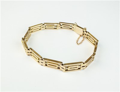 Lot 125 - A yellow metal bar link panel bracelet