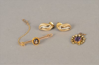 Lot 91 - A garnet brooch, a pair of 9ct gold earrings and an amethyst pendant