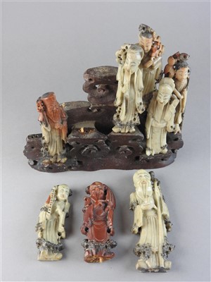 Lot 13 - A Chinese carved soapstone group of the eight...