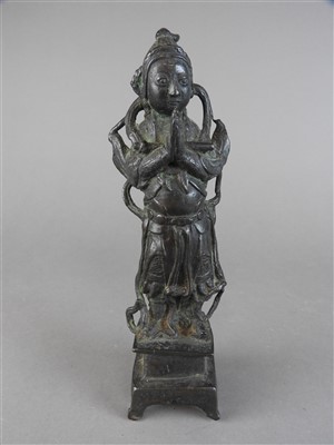 Lot 125 - A Chinese bronze figure of standing deity,...