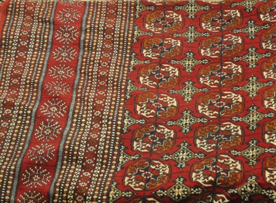 Lot 808 - An Afghan Bukhara carpet, the raspberry field,...