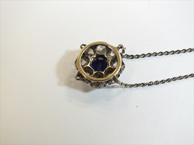 Lot 61 - A sapphire and diamond pendant