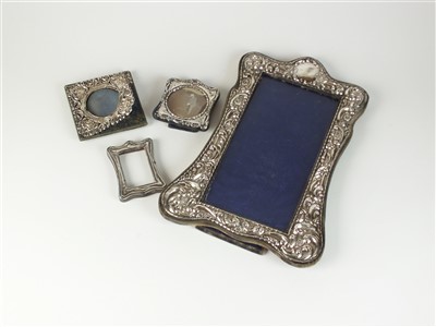 Lot 357 - A collection of four silver mounted frames
