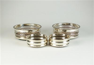 Lot 30 - Two pairs of silver coasters