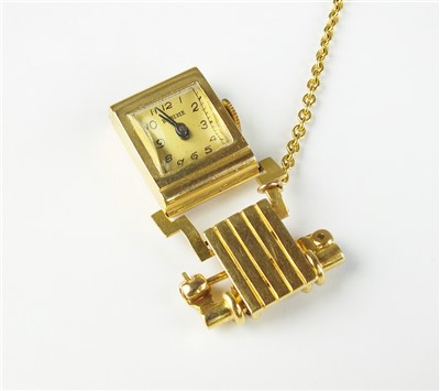 Lot 128 - A yellow metal Bucherer fob brooch watch