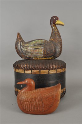 Lot 469 - Two decorative Indonesian (Java) ducks and a wicker storage box