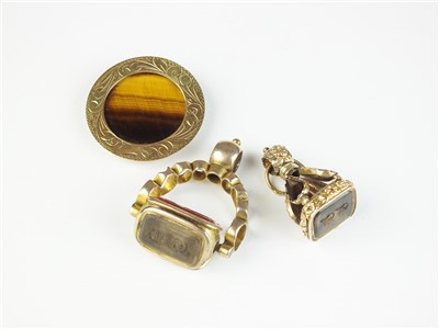 Lot 138 - Two seal fobs and a brooch