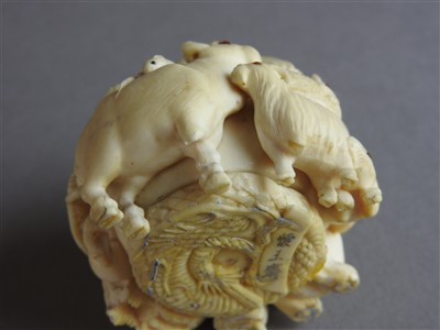 Lot 75 - A Japanese carved ivory okimono, Meiji period...
