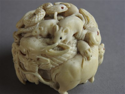 Lot 75 - A Japanese carved ivory okimono, Meiji period...