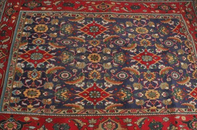 Lot 442 - A Tabriz carpet, North-West Iran, the deep...