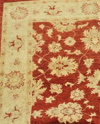 Lot 832 - An Afghan "Ziegler", the faded crimson field...