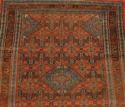 Lot 823 - A North-West Persian runner, the terracotta...