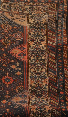 Lot 840 - A Kurdish rug, the indigo lattice field...