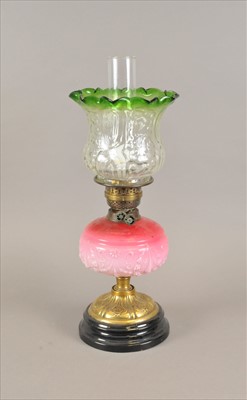 Lot 451 - A Victorian electrified oil lamp and shades