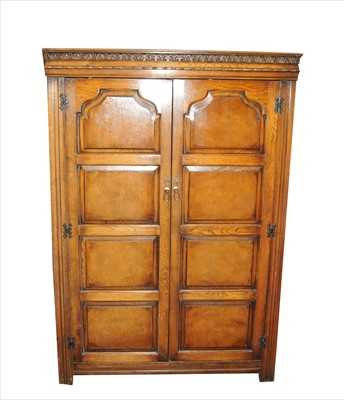 Lot 758 - A good quality reproduction oak double wardrobe
